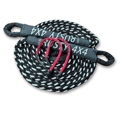 Small recovery strap with black-and-white braided rope and pink tie-down loops