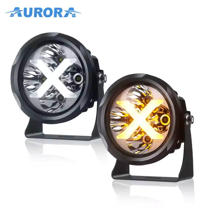Aurora 4-inch RGB LED light — pair showing white and amber cross-shaped light modes