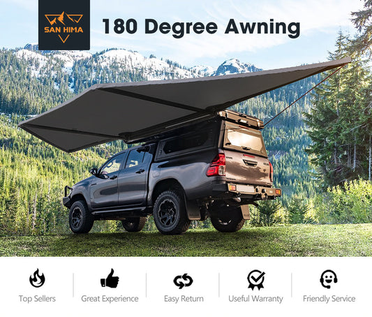 San Hima 180 degree free-standing awning deployed beside a bakkie