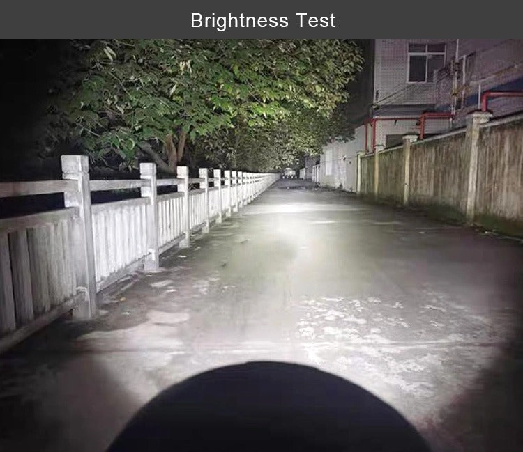 Aurora 4-inch RGB LED flood lights — white flood beam illuminating a road