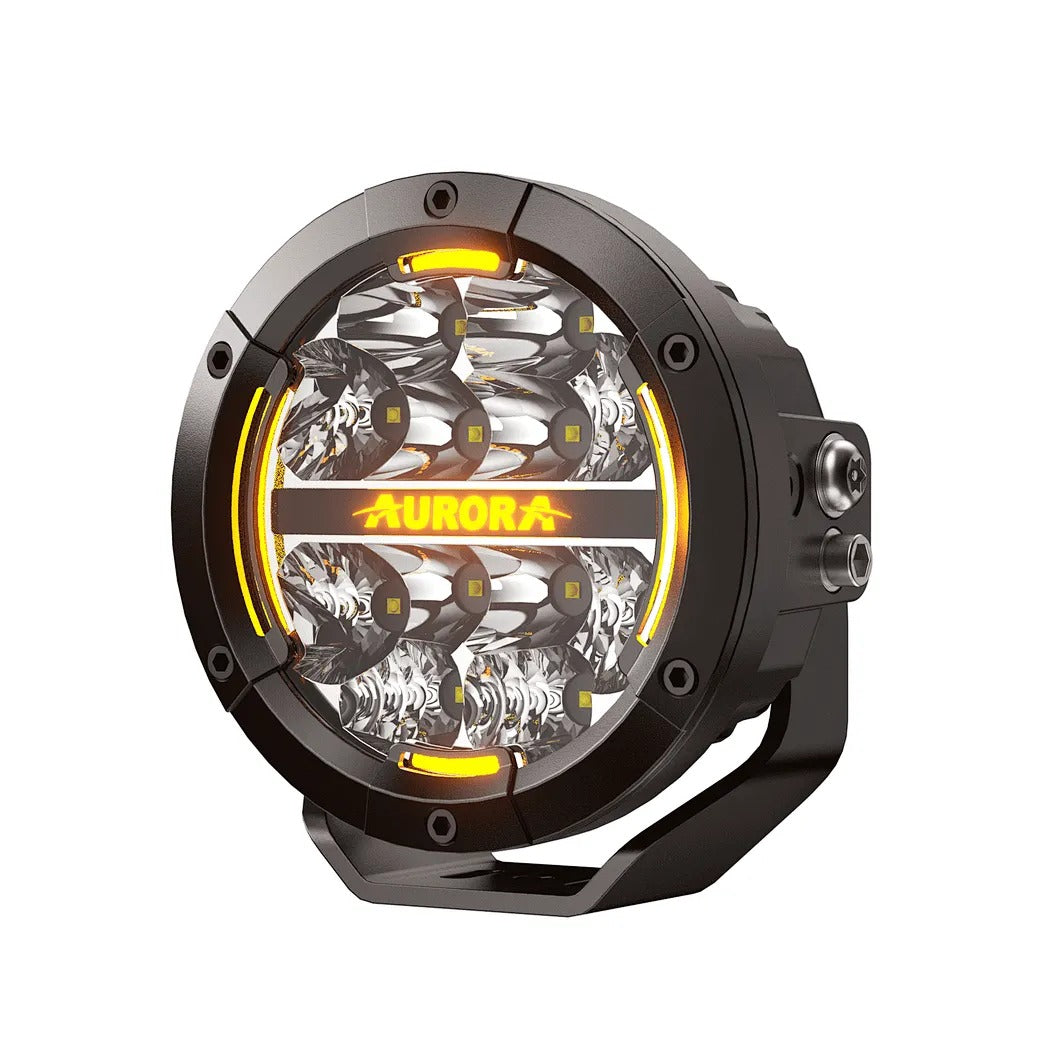 Aurora 5-inch driving light with amber DRL — front product view with amber daytime running light