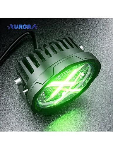 Aurora 4-inch RGB LED flood lights — angled product view with green backlight