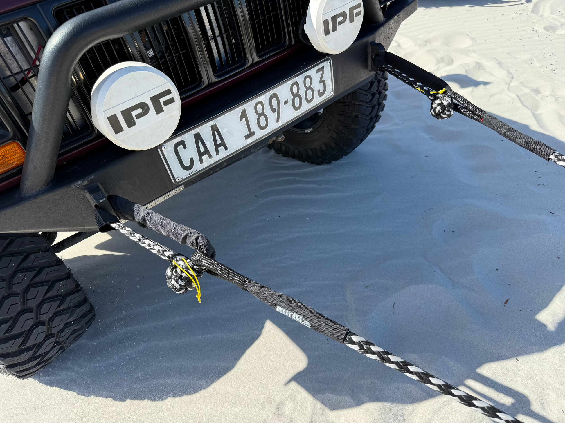 Braided bridle rope with metal hook and yellow strap near the equalizer section